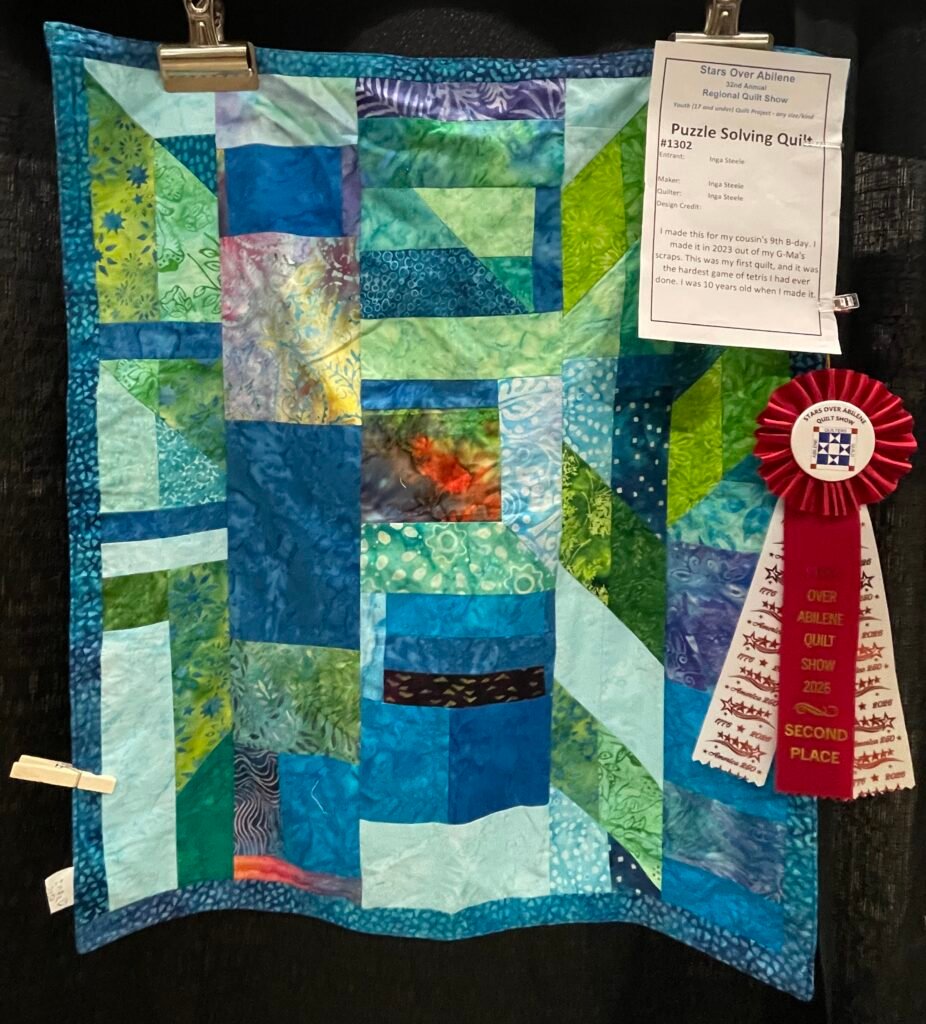 puzzle solving quilt by inga steele